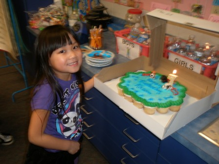 Kasen blowing out the candle